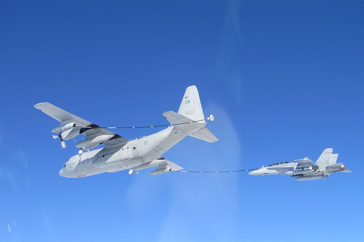 Air-to-Air refuelling with one tanker and a fighter aircraft in the air