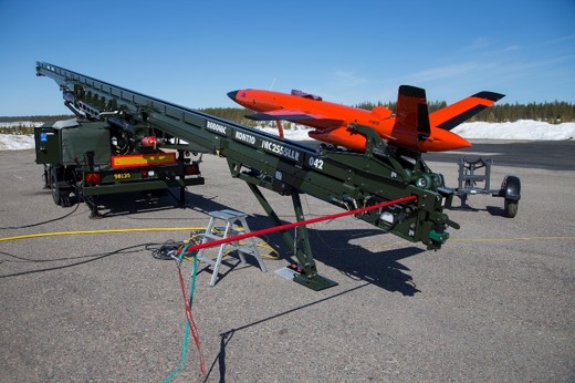 An orange coloured target drone FireJet on the launcher
