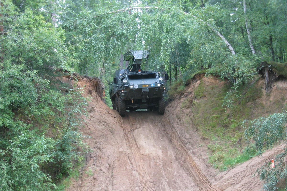 Armoured modular vehicle in terrain test track